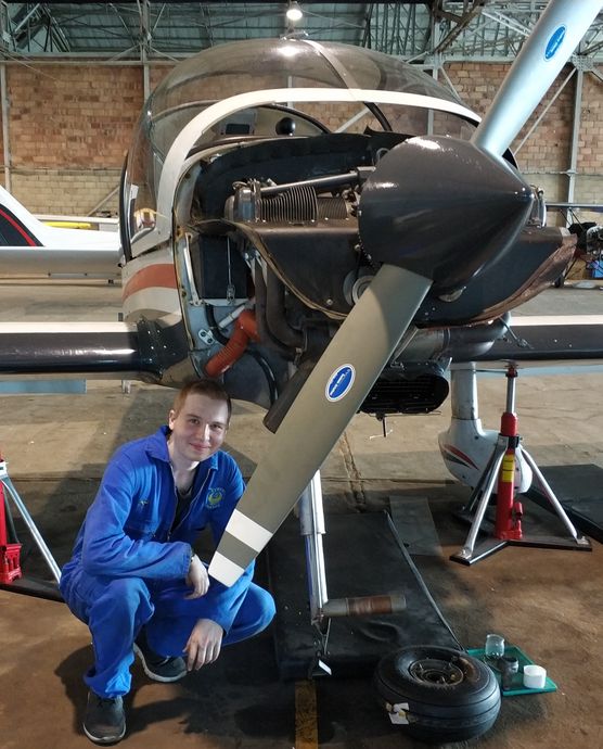 Underneath the DR400, removing the torque link