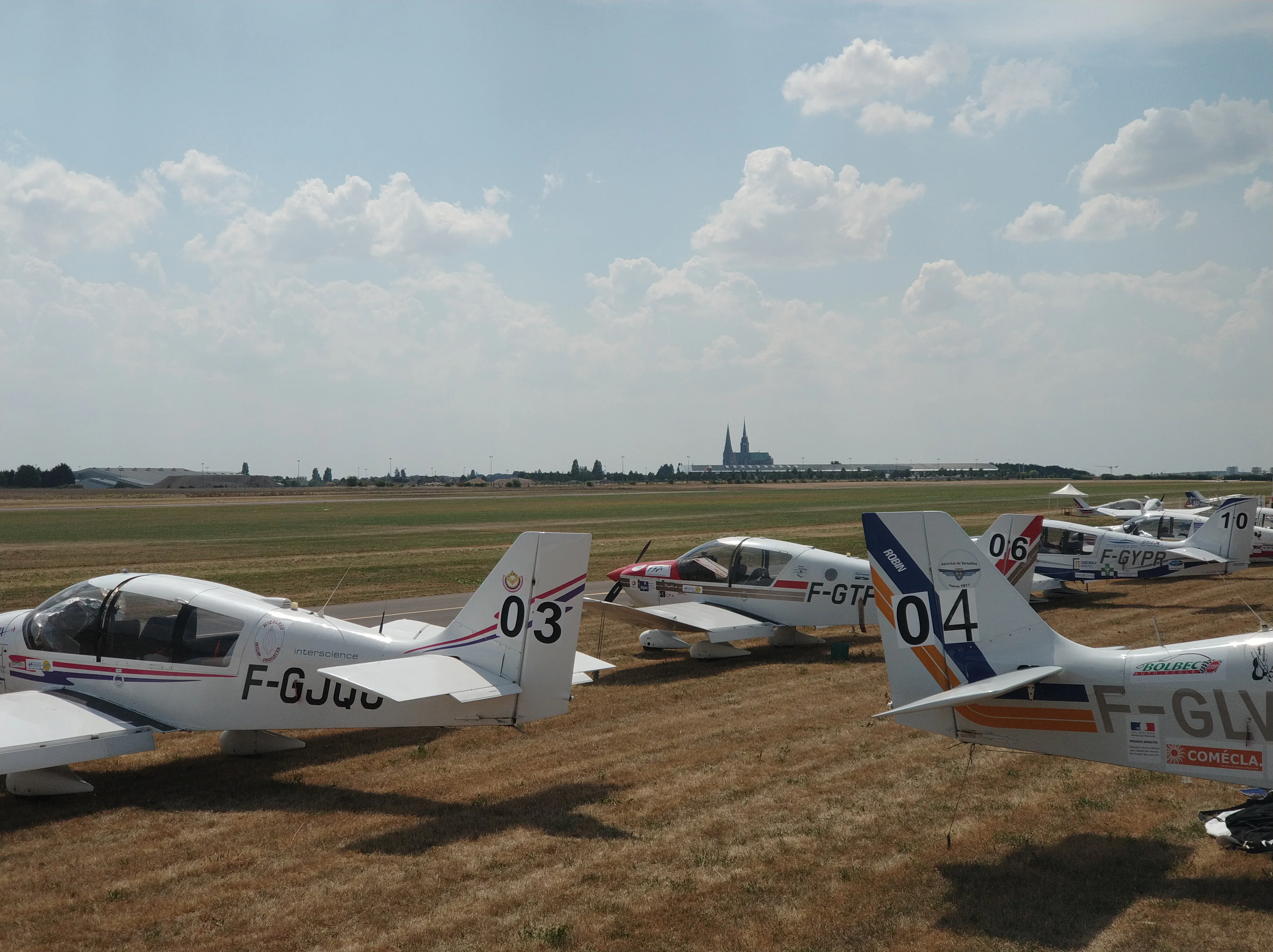 The parked aircrafts with the Chartres cathedral in the background